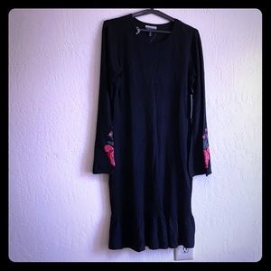 Black dress with embroidered sleeves